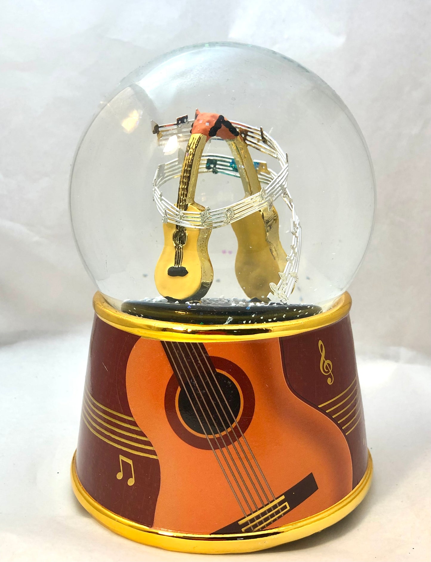 Snow globe with guitar